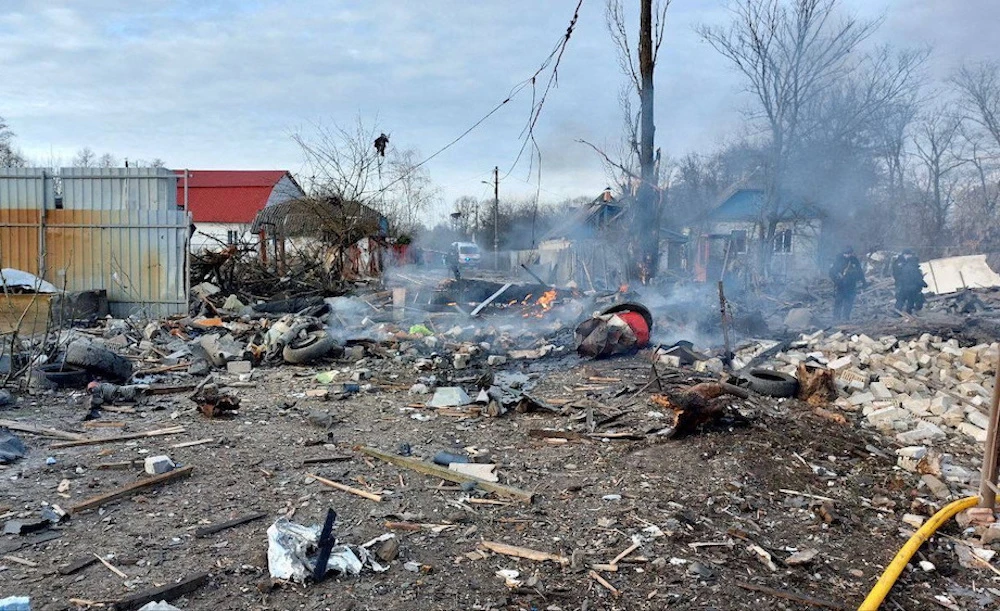 Rescuers a site of private houses heavily damaged by a Russian missile strike in Kyiv on Dec. 29, 2022. (Telegram via Reuters)
