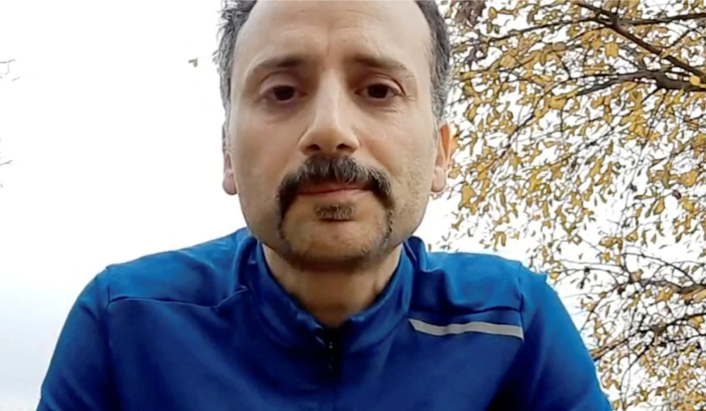 Mohammad Moradi, an Iranian who committed suicide to bring awareness to 'Woman, life, freedom" movement in Iran, delivers his suicide speech in Lyon, France, in this screen grab obtained from a social media video released on December 26, 2022. (REUTERS)