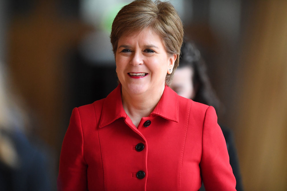 Scotland’s First Minister Nicola Sturgeon arrives to attend First Minster’s Questions at the Scottish Parliament. (AFP)