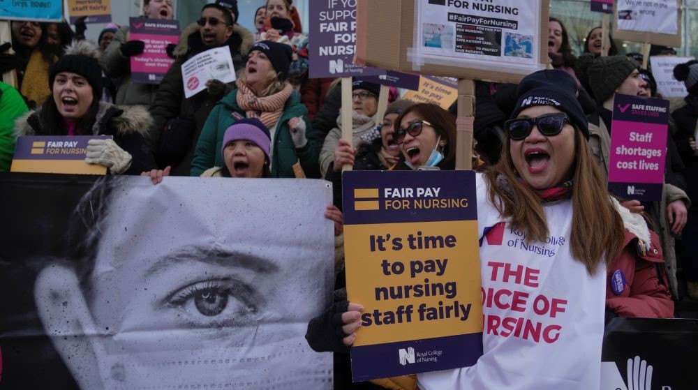 Nurses on strike outside the Royal College of Nursing, London, England, Wednesday, Jan. 18, 2023. (AP Photo)