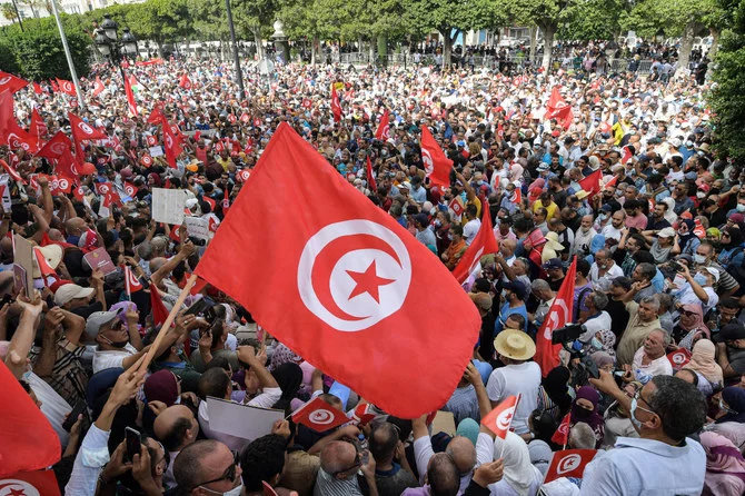 Protesters in Tunis rail against President Kais Saied’s tightening grip on power. (AFP/File)
