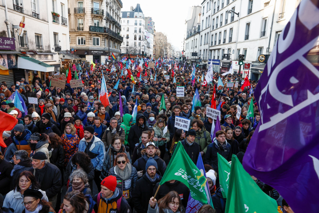 Demonstrators attend a rally, to protest against the French government's pension reform plan in Paris, France. (Reuters)