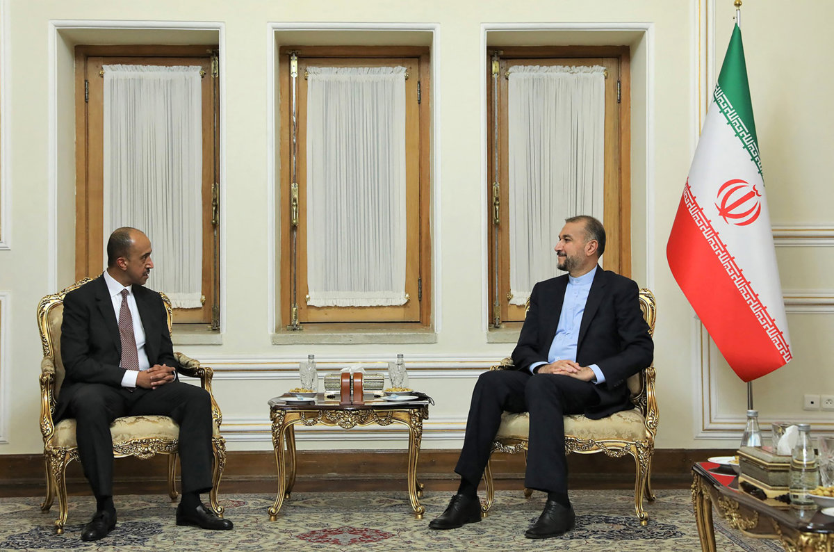 Iranian FM Hossein Amir Abdollahian (R) meeting with the envoy of Kuwaiti Bader Abdullah Al-Munaikh in Tehran last year. (AFP)