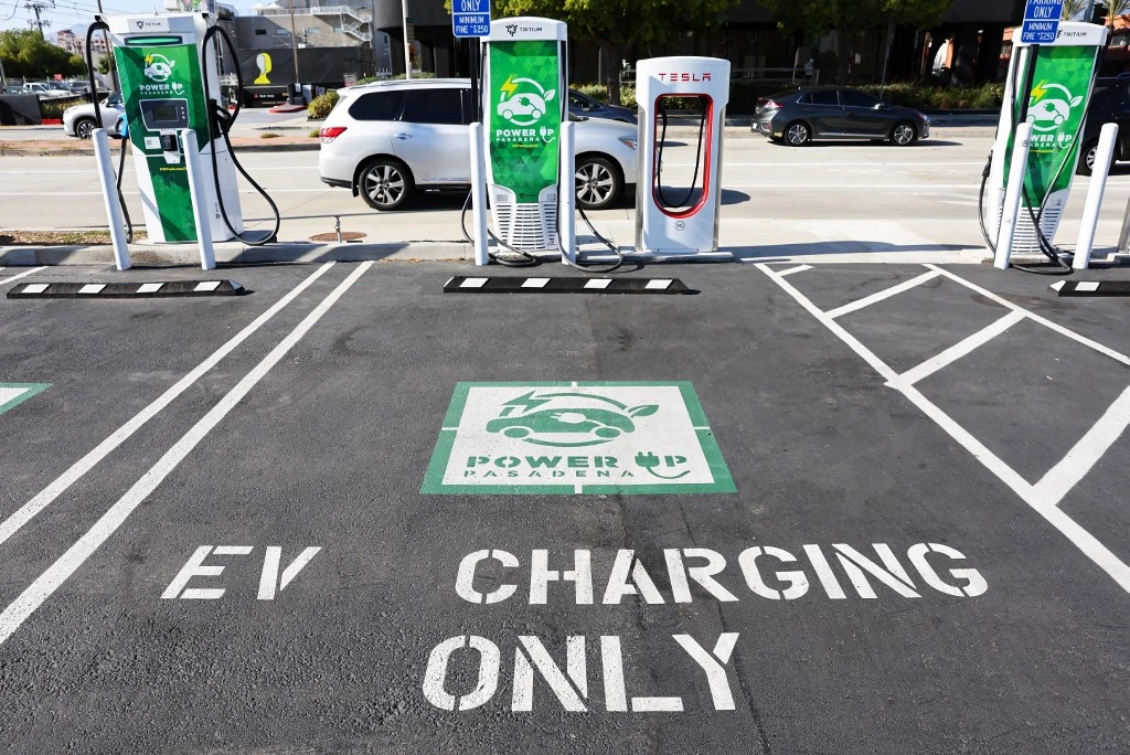 Many governments around the world look to promote EV usage to help combat climate change (File/AFP)