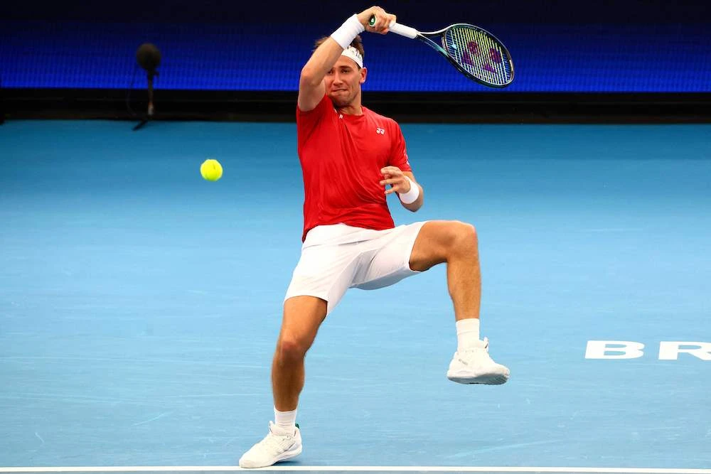 Norway's Casper Ruud hits a return against Brazil's Thiago Monteiro during their men's singles match of the United Cup tennis tournament at Pat Rafter Arena in Brisbane on Sunday. (AP)