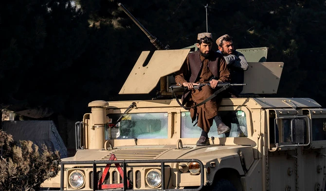 Taliban fighters stand guard at the site of an explosion, near the Interior Ministry, in Kabul, Afghanistan, on January 1, 2023. (AP)
