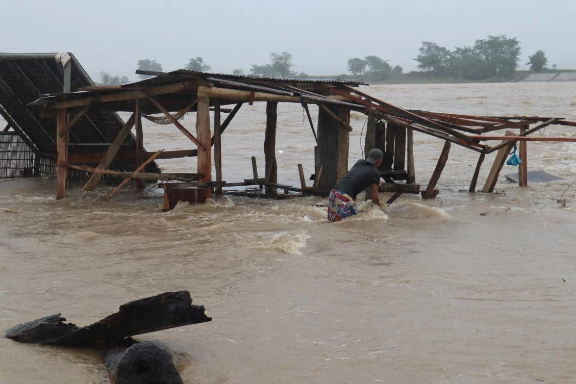 More than 270,000 people had to seek emergency shelter as downpours inundated rural villages. (AFP)