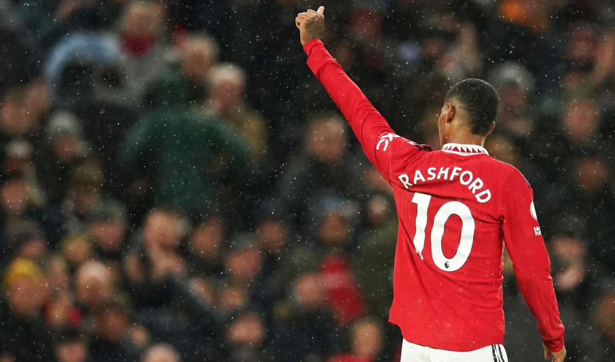 Manchester United's Marcus Rashford celebrates after scoring his side's third goal during the English Premier League match against Bournemouth at Old Trafford on Tuesday, Jan. 3, 2023. (AP)