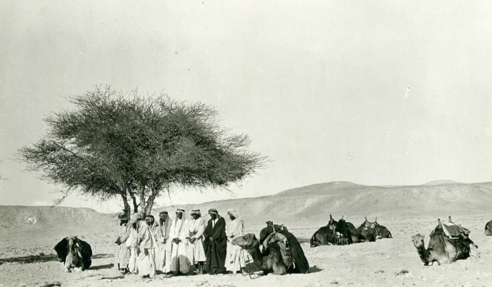 British explorer and documentarian Harry St. John Philby captioned the picture ‘Prayer under an acacia’. He undertook an information- gathering expedition across what is now modern-day Saudi Arabia. (Photos Heart of Arabia site)
