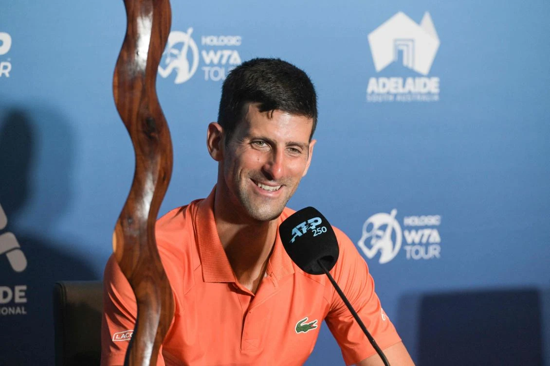 Serbian tennis player Novak Djokovic attends a press conference with the winner’s trophy after the final of the ATP Adelaide International tournament against Sebastian Korda of the US at the ATP Adelaide International tournament in Adelaide on January 8, 2023. (AFP)