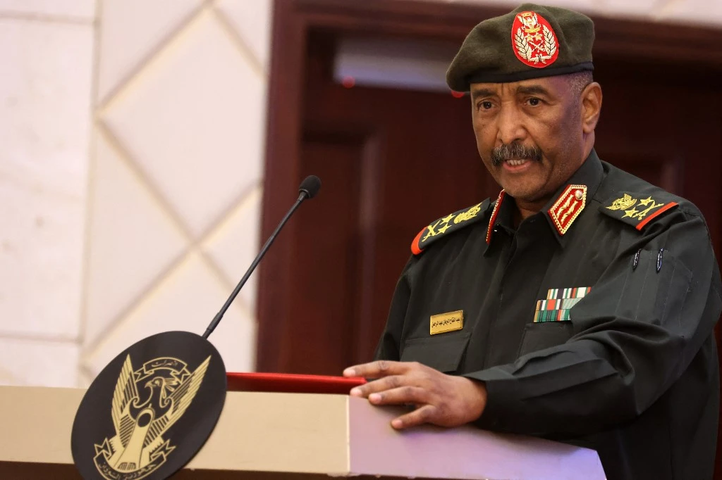 Sudan’s Army chief Abdel Fattah Al-Burhan speaks following the signing of an initial deal aimed at ending a crisis caused by a military coup, in Khartoum on December 5, 2022. (AFP)