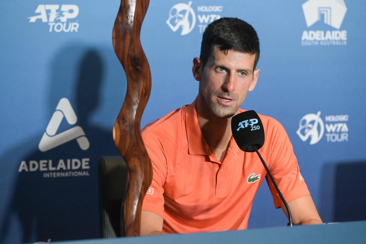Serbian tennis player Novak Djokovic at a press conference with the winner's trophy after the final of the ATP Adelaide International tournament against Sebastian Korda of the US. (AFP)