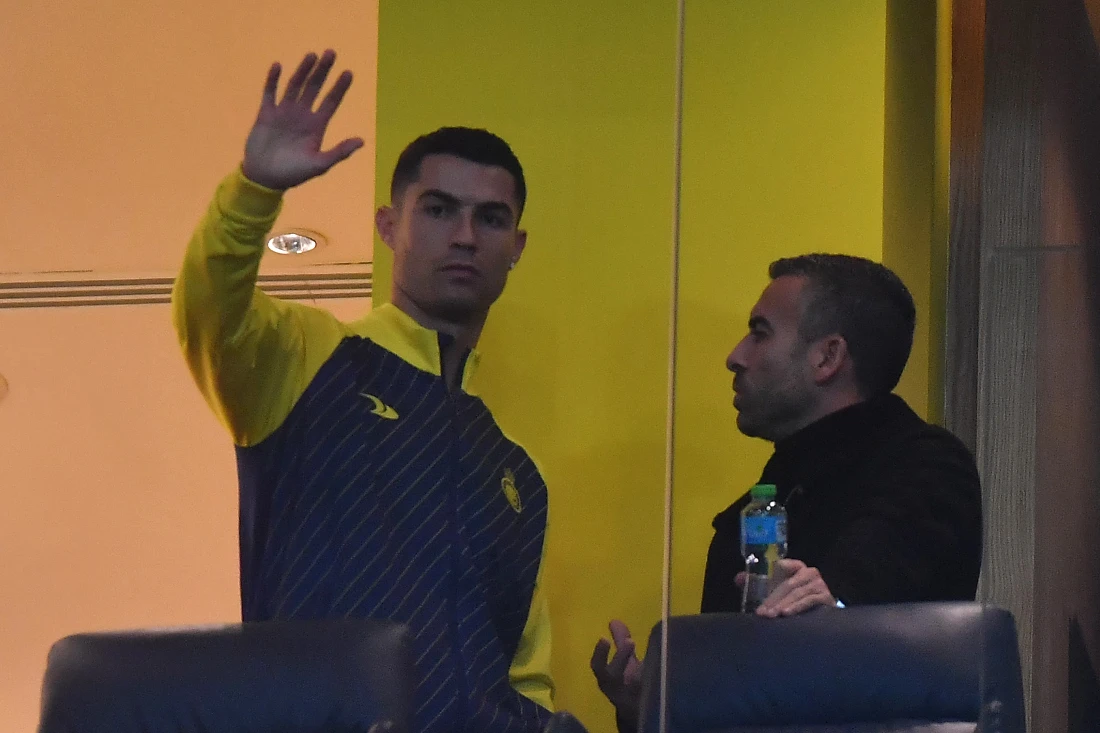 Al-Nassr’s Portuguese forward Cristiano Ronaldo watches from the VIP area ahead of the Saudi Pro League football match between Al-Nassr and Al-Tai at the Mrsool Park Stadium in Riyadh. (File/AFP)