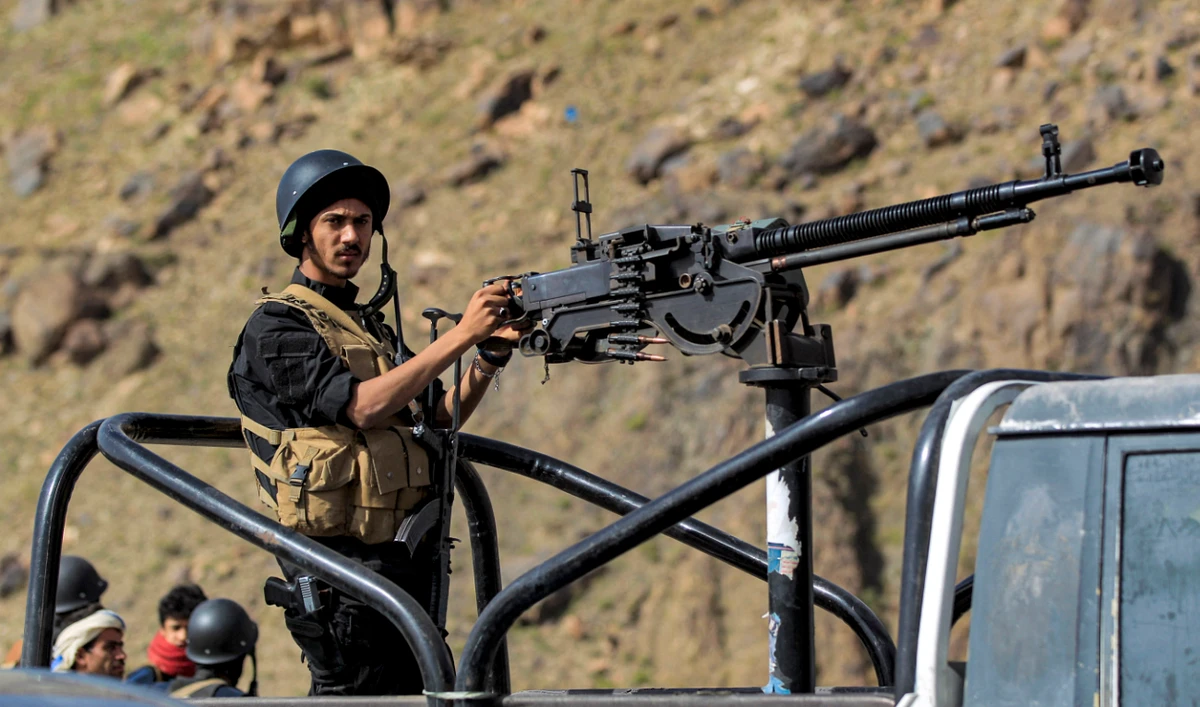 A member of security forces loyal to Yemen's Houthis mans a turret in a technical vehicle on June 26, 2021. (AFP/File)