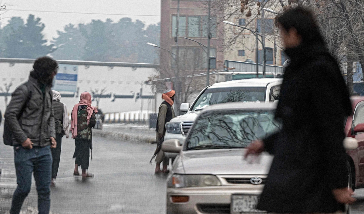 Members of Taliban security force stand guard along a blocked road after a suicide blast near Afghanistan's foreign ministry at the Zanbaq Square in Kabul on January 11, 2023. (AFP/File)