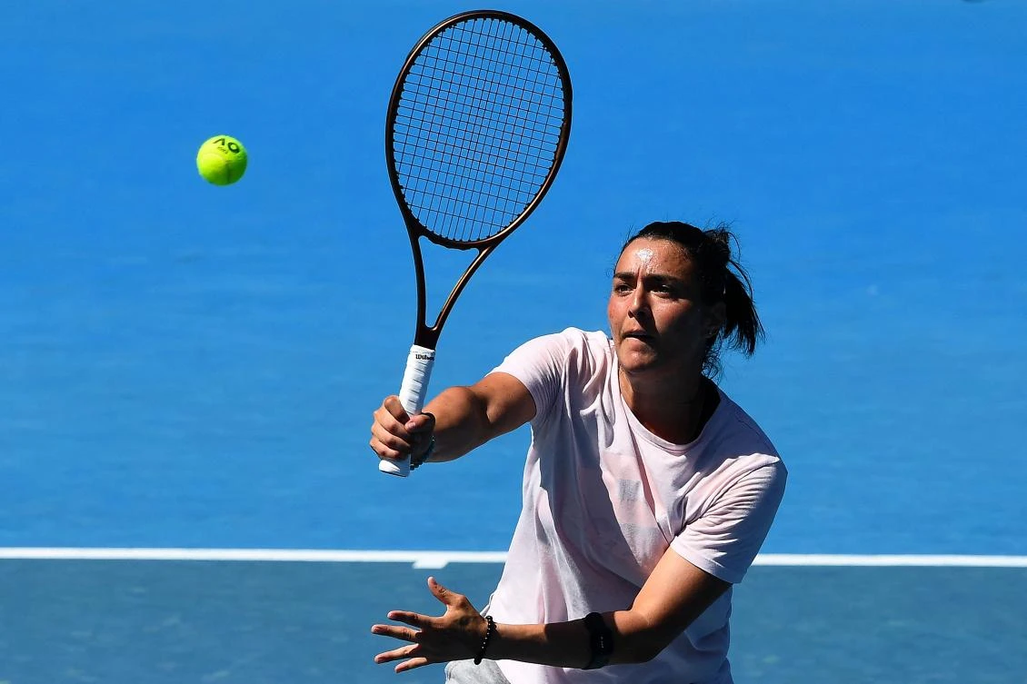 Tunisia's Ons Jabeur hits a return during a practice session ahead of the Australian Open tennis tournament in Melbourne on January 14, 2023. (AFP)
