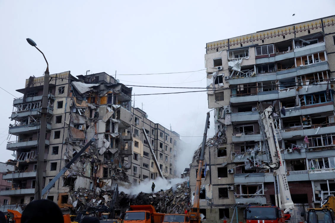 Emergency personnel work at the site where an apartment block was heavily damaged by a Russian missile strike, amid Russia's attack on Ukraine, in Dnipro, Ukraine Jan. 15, 2023. (Reuters)