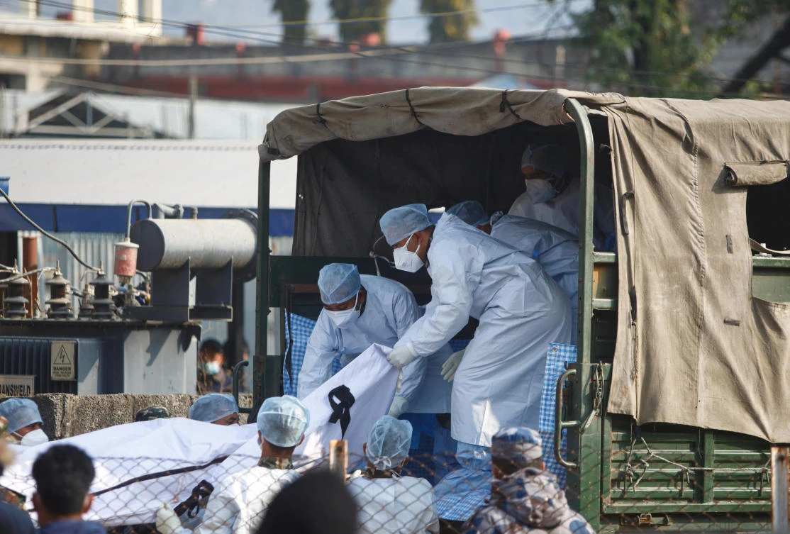 Hospitals return bodies from Nepal air crash to grieving families