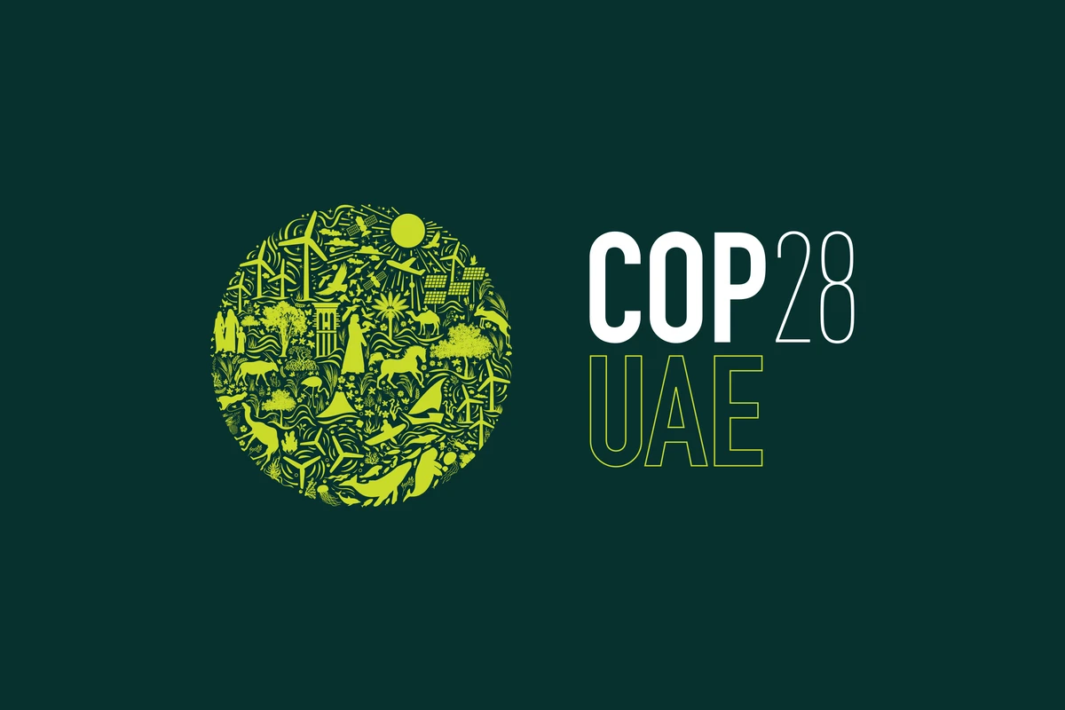 The spherical design in light and dark green includes a collection of diverse icons, from people and renewable energy technologies to wildlife and nature, encapsulated in one globe. (WAM)