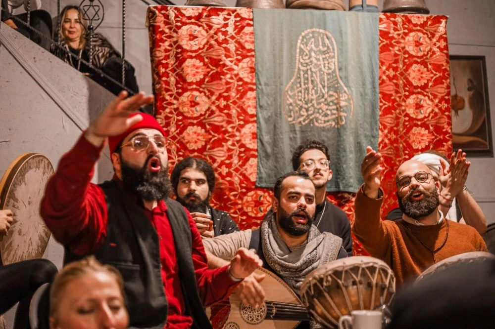 The musical ensemble, comprising 10 musicians, performs Arab Sufi and meshk music under the leadership of Abdullah Kaymak. (AN Photo)