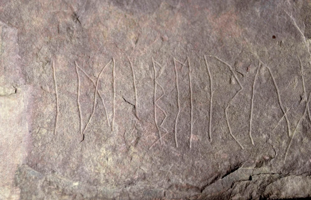 The runestone found at Tyrifjorden, Norway, is shown at the Museum of Cultural History in Oslo, Thursday, Jan. 12, 2023. (AP)