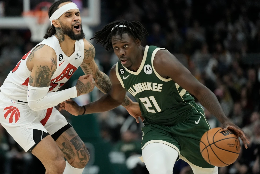 Jrue Holiday scores season-high 37 points as Giannis-less Bucks ease past Raptors 130-122