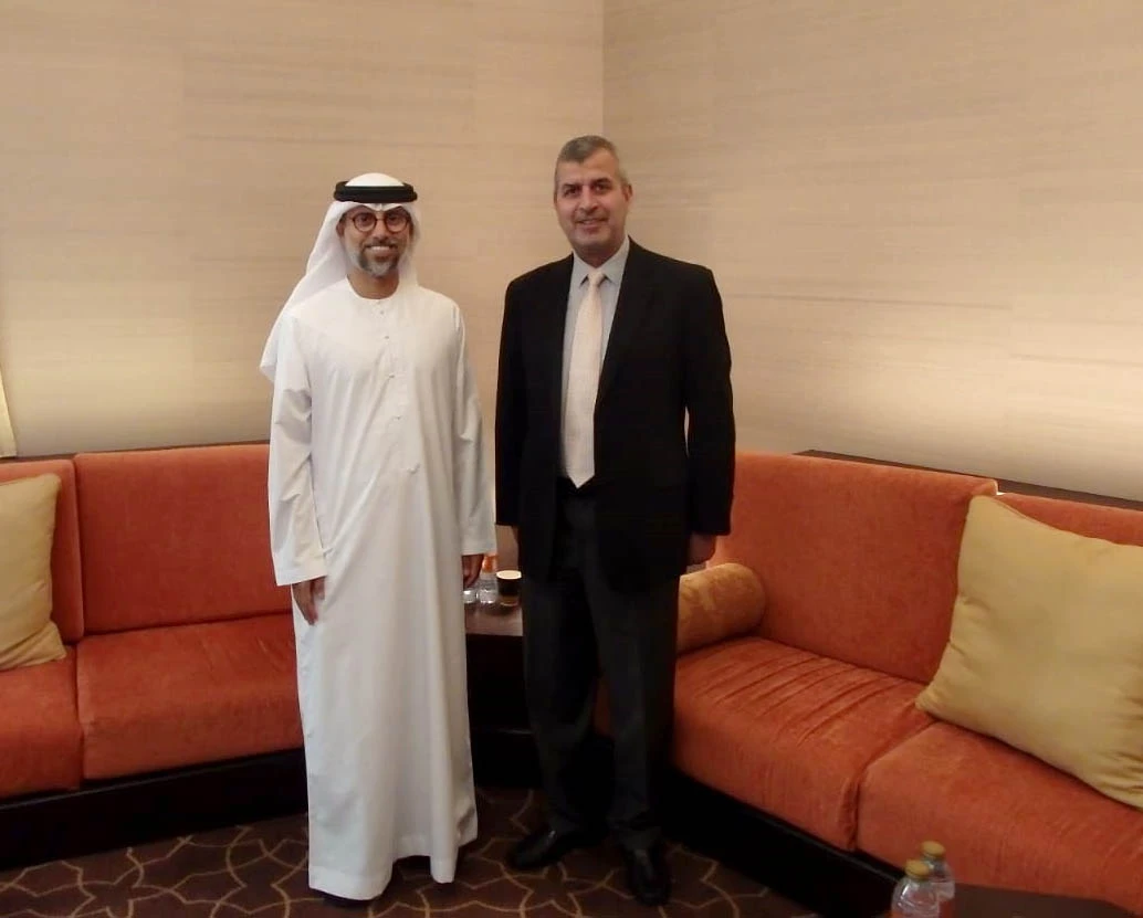 Jordan’s minister of energy and mineral resources Saleh Kharabsheh with Suhail Mohammed Al-Mazrouei, the UAE’s minister of energy and infrastructure, during a visit to participate in Abu Dhabi Sustainability Week. (Petra)