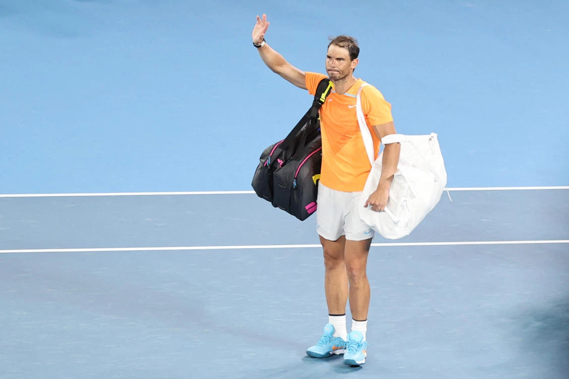 Spain’s Rafael Nadal waves as he leaves after his men’s singles against Mackenzie McDonald of the US on day three of the Australian Open tennis tournament in Melbourne on January 18, 2023. (AFP)