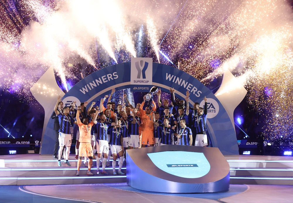 Inter's players celebrate after winning the Italian Super Cup football match between AC Milan and Inter Milan. (Reuters)