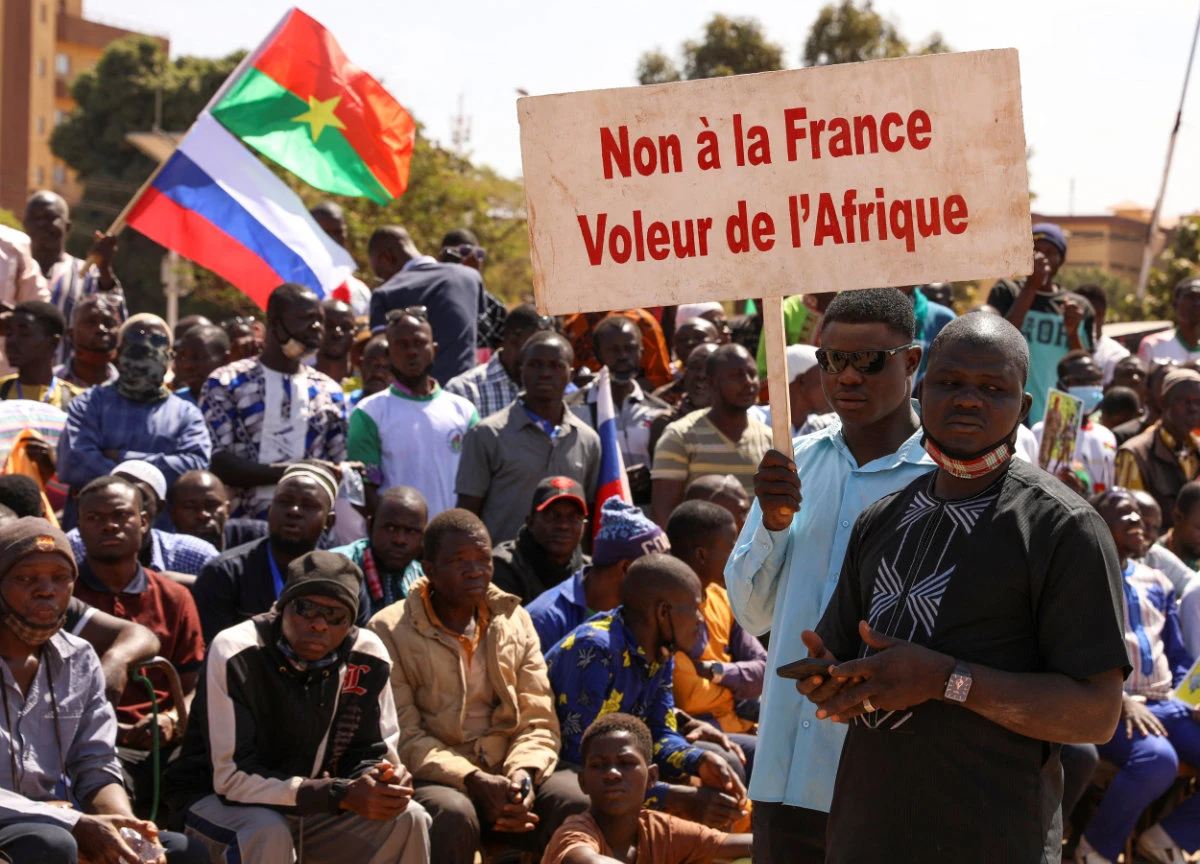 People gather in Ouagadougou on January 20, 2023. to show their support to Burkina Faso's new military leader Ibrahim Traore and demand the departure of the French ambassador. (Reuters)