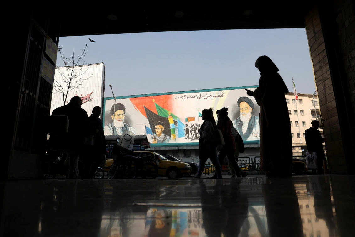 A mural depicting Iran’s Supreme Leader Ayatollah Ali Khamenei and late leader Ayatollah Ruhollah Khomeini is seen in Tehran on January 25, 2023. A display panel outside Paris, where Khomeini stayed during exile, was badly damaged on Wednesday. (Reuters)