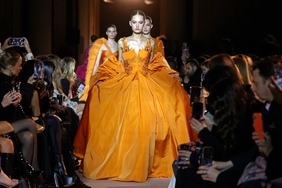 The Ras Baalbek-born designer’s new collection features form-fitting gowns, voluminous capes, high-slit dresses and more. (Getty Images)