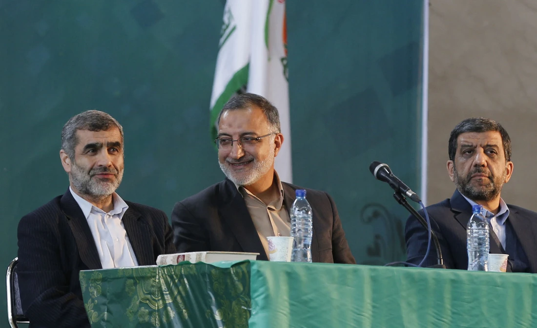 Iranian Tourism Minister Ezzatollah Zarghami (C) was strongly criticized by ultra-conservatives in October after reportedly criticizing the morality police. (File/AFP)