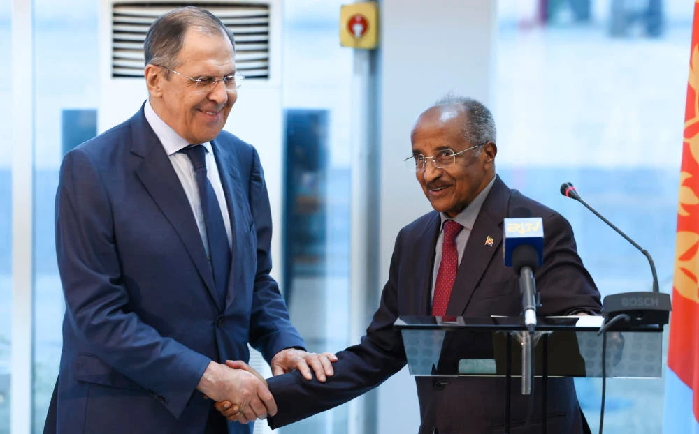 In this handout photo released by Russian Foreign Ministry Press Service, Russian Foreign Minister Sergey Lavrov, left, and Eritrea's Foreign Minister Osman Saleh Mohammed shake hands after their joint news conference following their talks in Asmara, Eritrea, Thursday, Jan. 26, 2023. (AP)