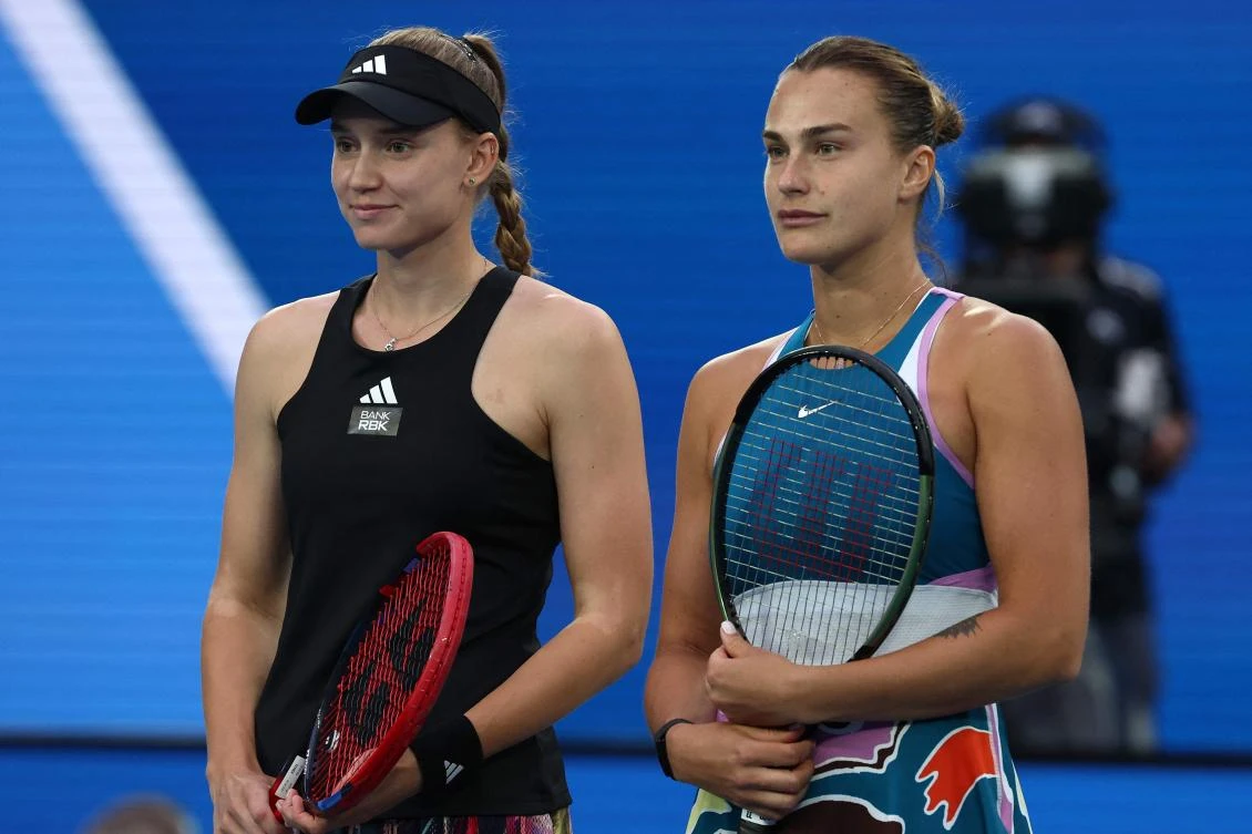Kazakhstan’s Elena Rybakina and Belarus’ Aryna Sabalenka pose for pictures before their women’s singles final match on day thirteen of the Australian Open tennis tournament in Melbourne on Jan. 28, 2023. (AFP)