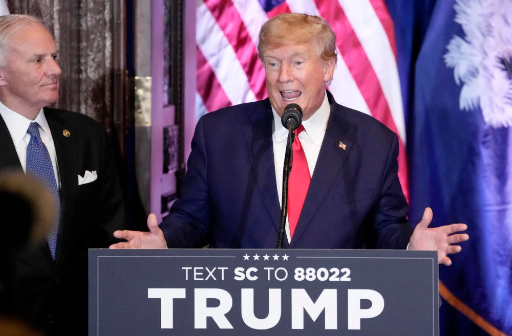 Former President Donald Trump speaks at a campaign event at the South Carolina Statehouse, Saturday, Jan. 28, 2023, in Columbia, S.C. South Carolina Gov. Henry McMaster, listens at left. (AP)