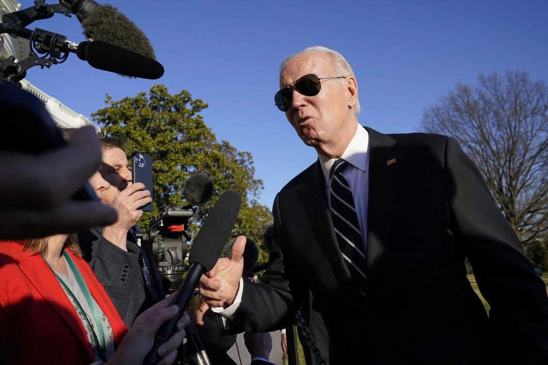 President Joe Biden talks to reporters on the South Lawn of the White House in Washington, Monday, Jan. 30, 2023. (AP Photo)