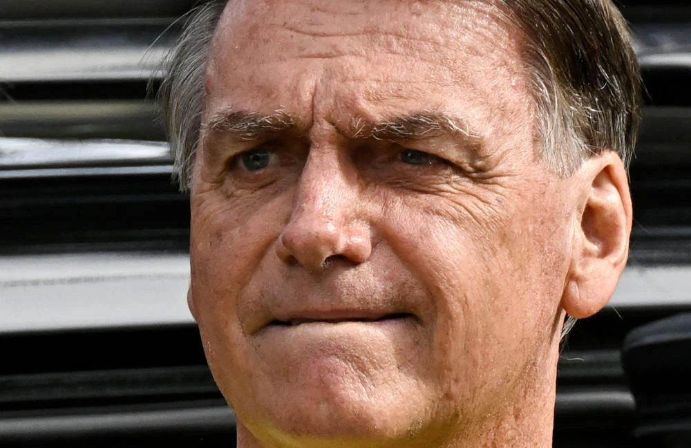 Probed in Brazil, Bolsonaro seeks six more months in US