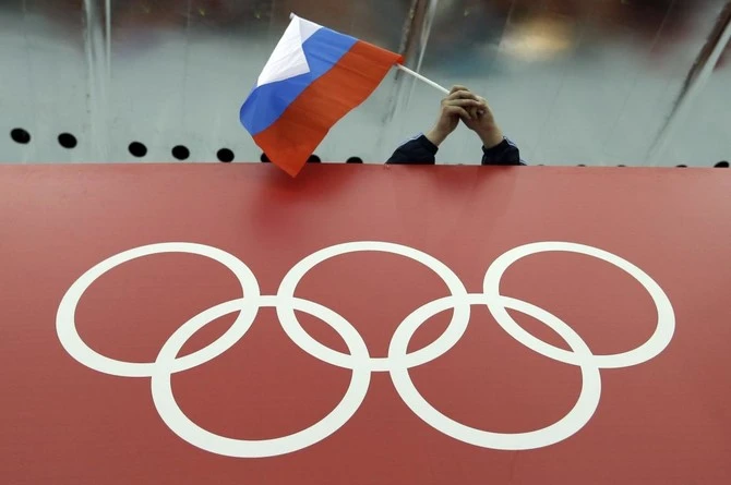 Russian Olympic chief says athletes must compete without restrictions