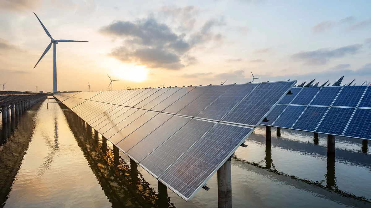 Green energy investment tops $1tn, matches fossil fuels