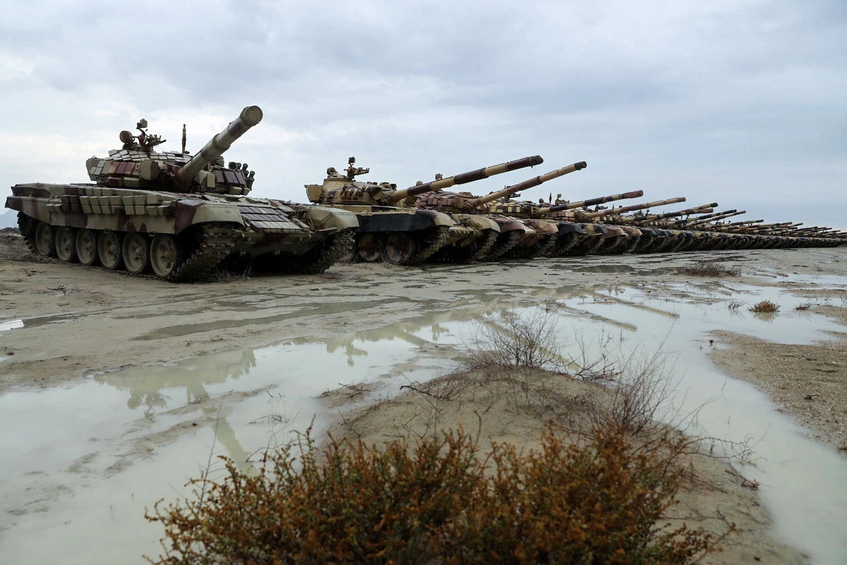 Iranian tanks take part in a military drill in the Gulf of Oman on Dec. 31, 2022. (Iranian Army via AFP)