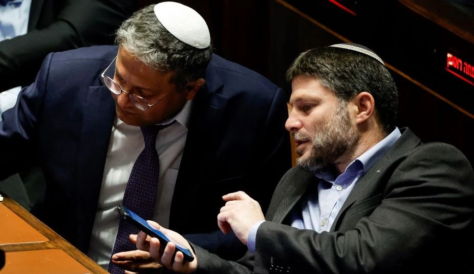 Itamar Ben-Gvir and Bezalel Smotrich in the Knesset, Jerusalem, Dec. 28, 2022. (Reuters)