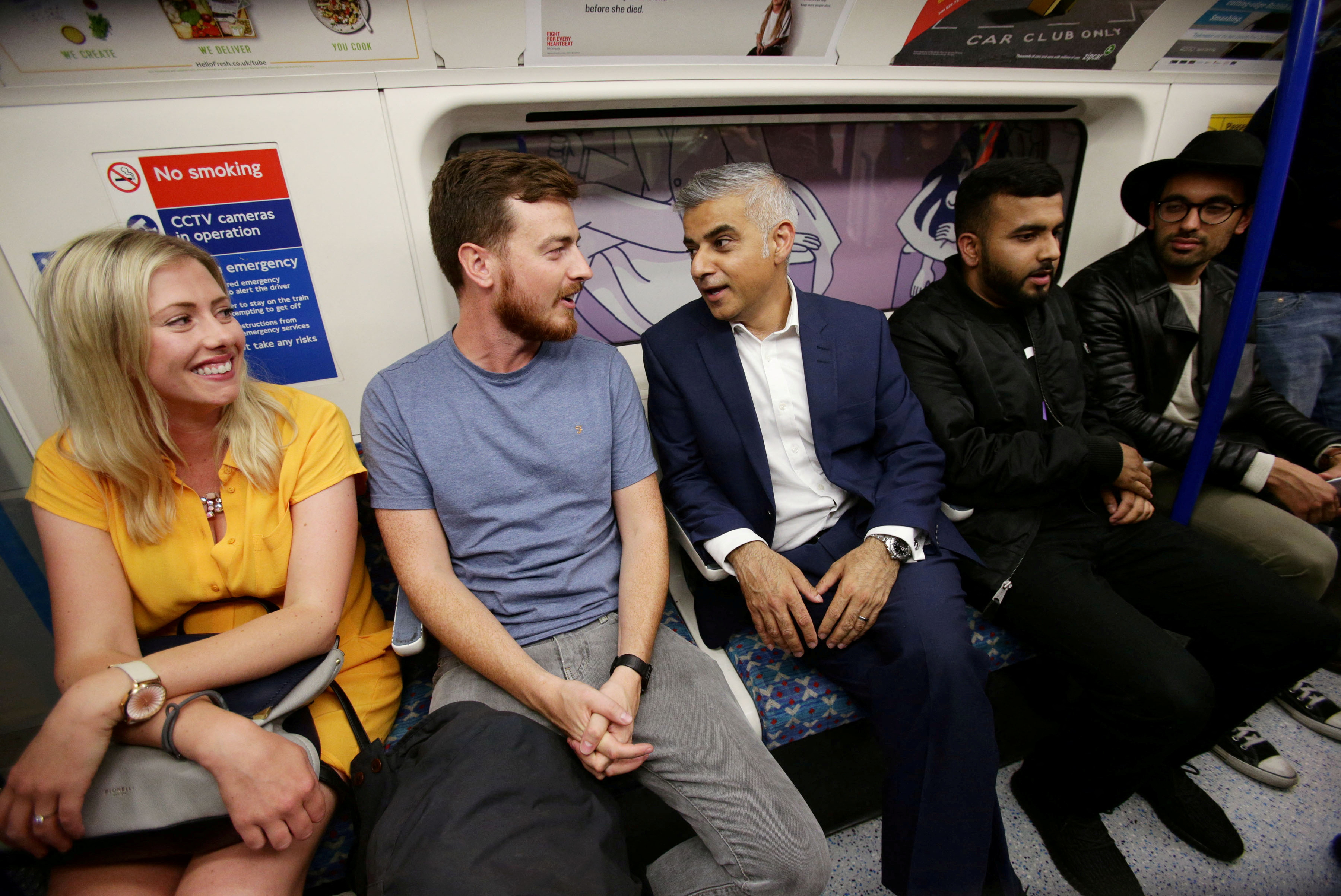 Mayor of London Sadiq Khan travels on the Victoria line during the launch of London’s Night Tube, Aug. 20, 2016. (Reuters)