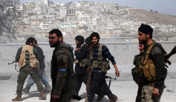 Turkish-backed Syrian rebels gather in the city of Afrin in northern Syria. (AFP)