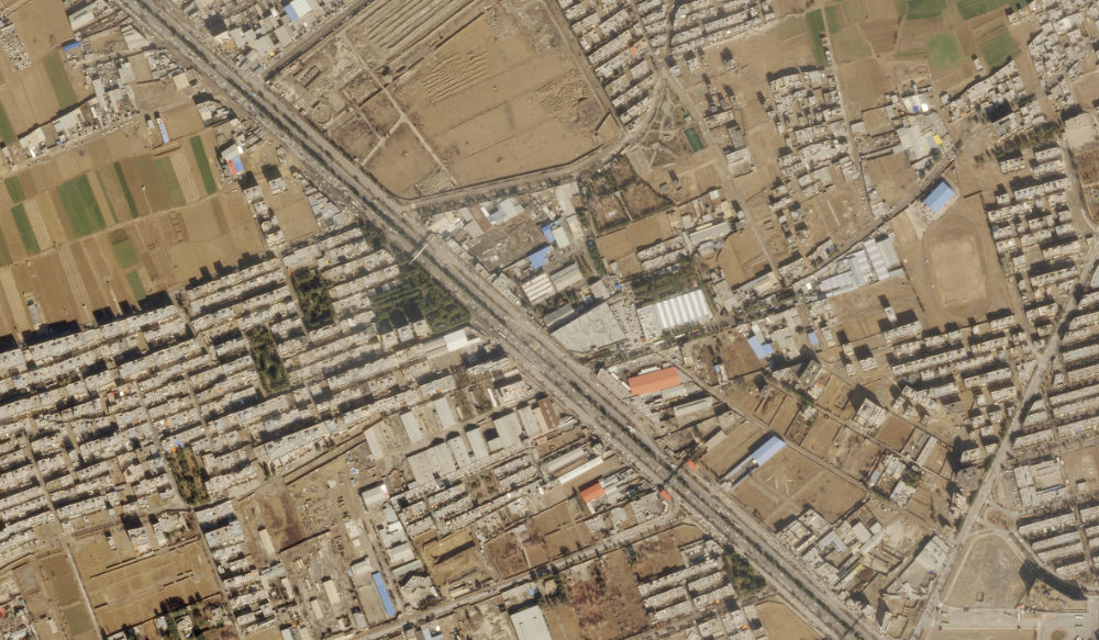 This satellite image from Planet Labs PBC shows damage on the roof of an Iranian military workshop, center, after a drone attack in Isfahan, Iran, Thursday, Feb. 2, 2023. (AP)