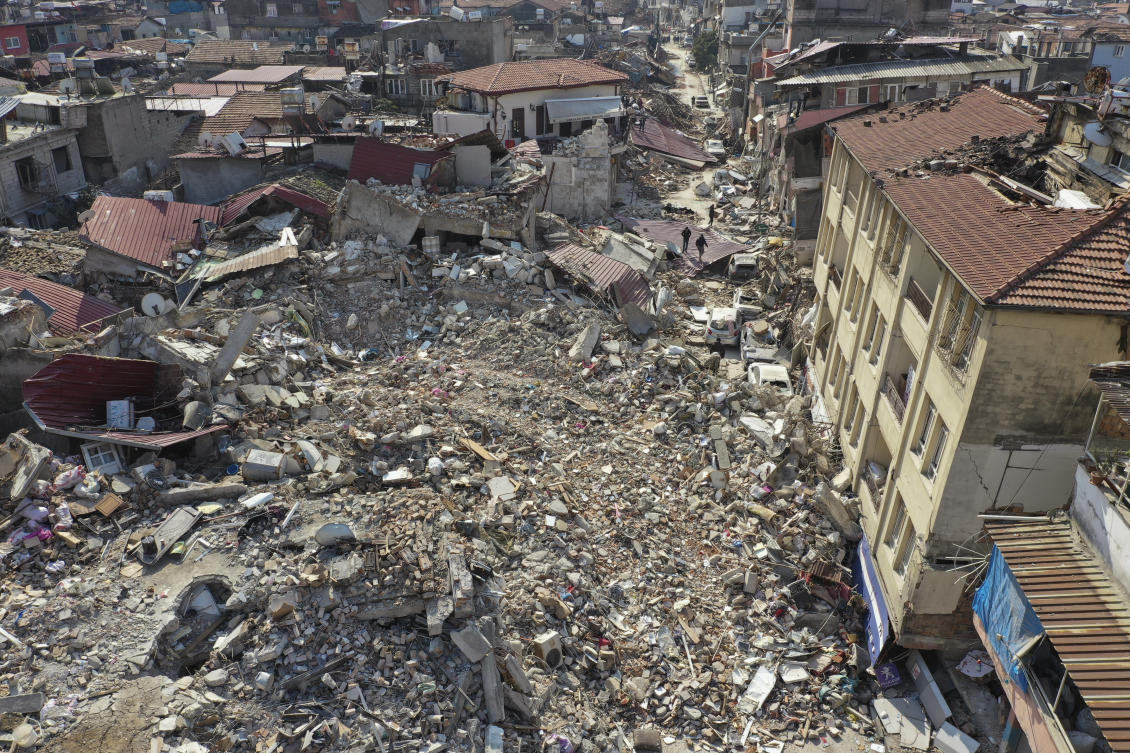 Thousands of buildings slumped onto their side or pancaked downward onto residents in Turkiye. (AP)