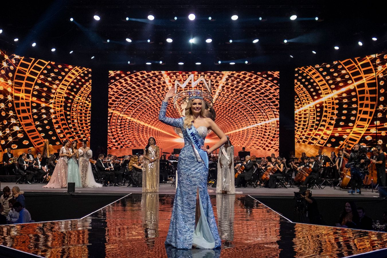 Miss Poland Karolina Bielawska waves after winning the 70th Miss World beauty pageant in Puerto Rico. (Getty)