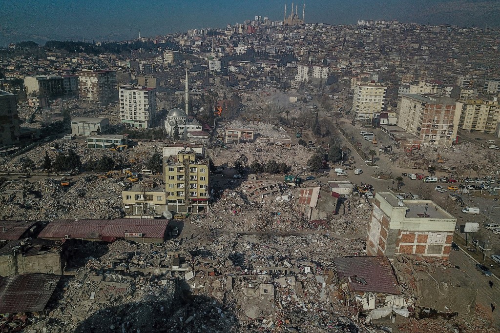 An aerial view shows collapsed buildings during ongoing rescue operations in Kahramanmaras, southeastern Turkey, eight days after a 7,8-magnitude struck. The death toll from a catastrophic earthquake that hit Turkey and Syria nears 40,000, with search and rescue teams starting to wind down their work.(AFP)