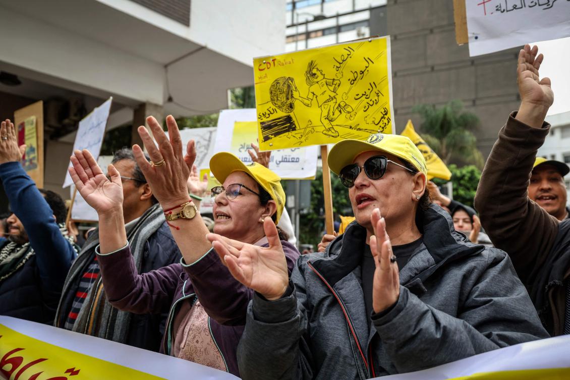 Supporters of the Democratic Confederation of Labor (CDT) attend a demonstration against high cost of living in Rabat. (AFP)