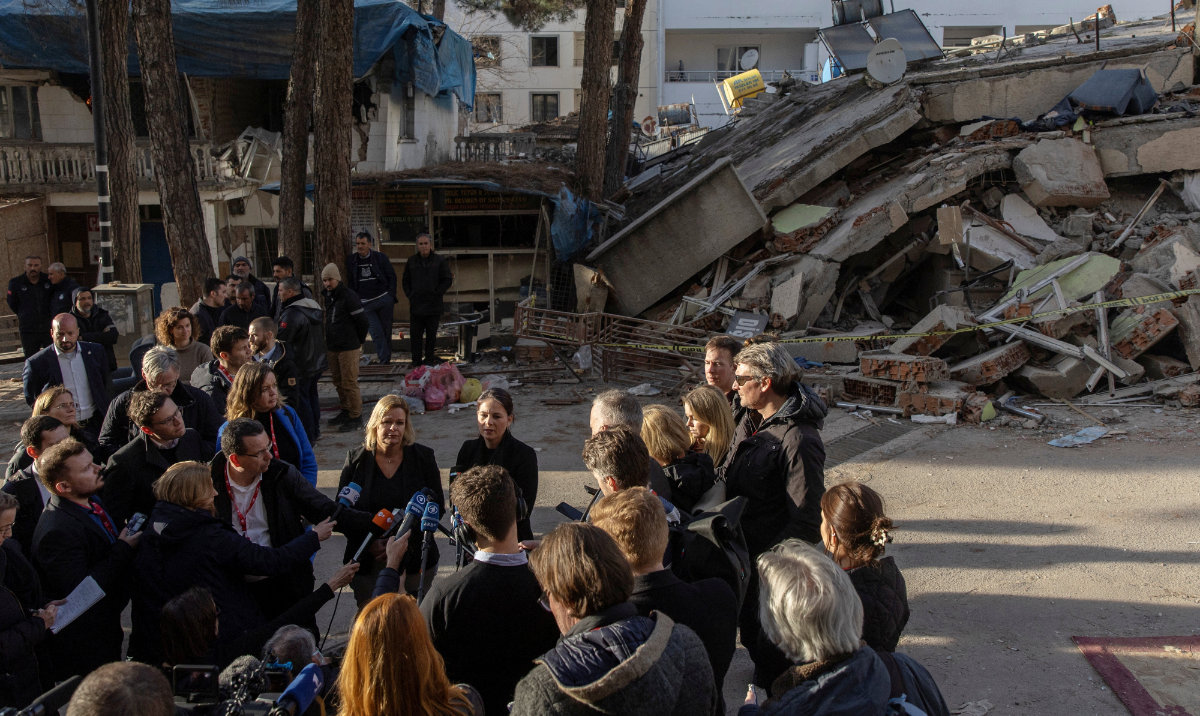 German Foreign Minister Annalena Baerbock and Interior Minister Nancy Faeser speak to the press at a street with collapsed building following the deadly earthquake in Pazarcik, Kahramanmaras, Turkey, February 21, 2023. (Reuters)